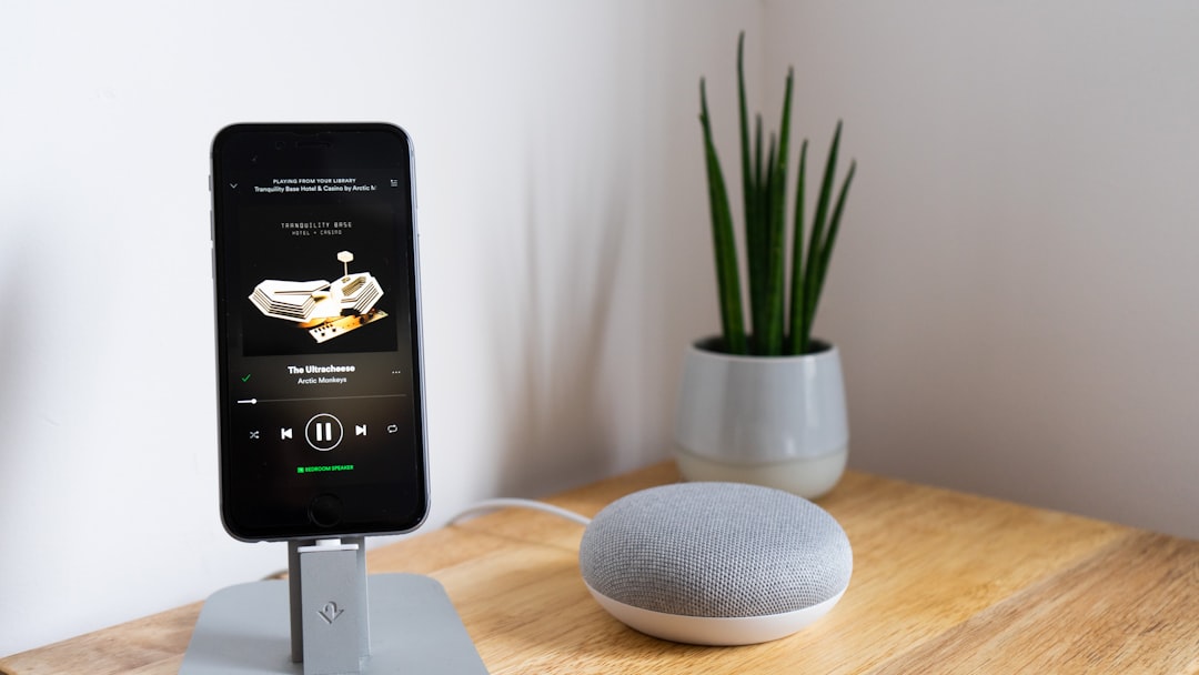 Smart speaker and smartphone displaying a radio app